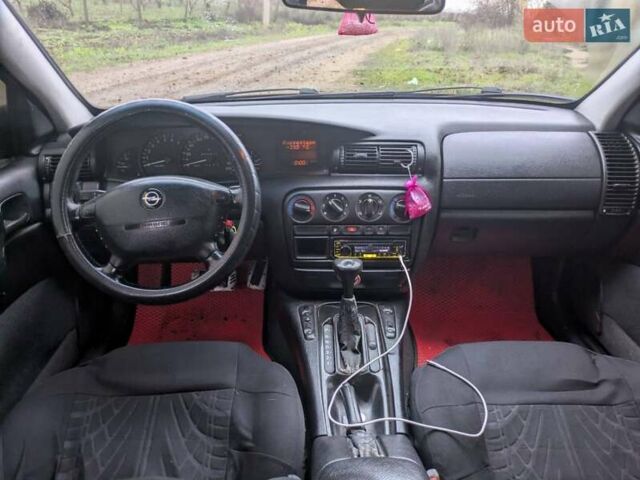 Фіолетовий Опель Омега, об'ємом двигуна 2 л та пробігом 350 тис. км за 2600 $, фото 6 на Automoto.ua