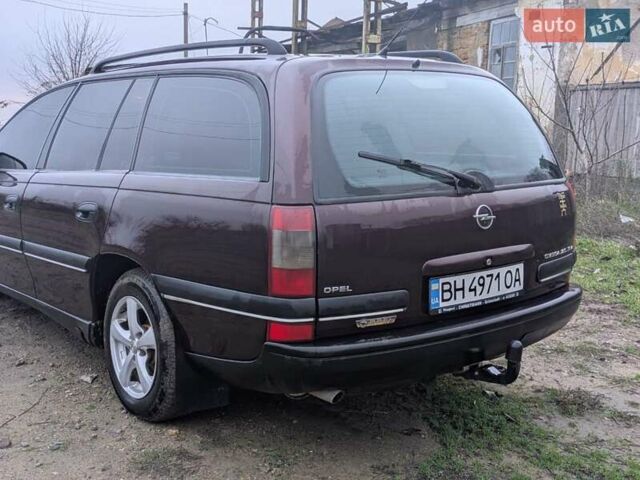 Фіолетовий Опель Омега, об'ємом двигуна 2 л та пробігом 350 тис. км за 2600 $, фото 4 на Automoto.ua