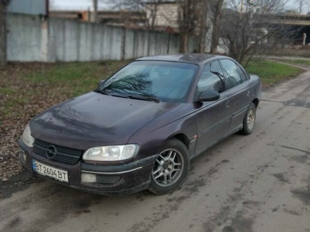 Коричневий Опель Омега, об'ємом двигуна 2 л та пробігом 400 тис. км за 1184 $, фото 9 на Automoto.ua