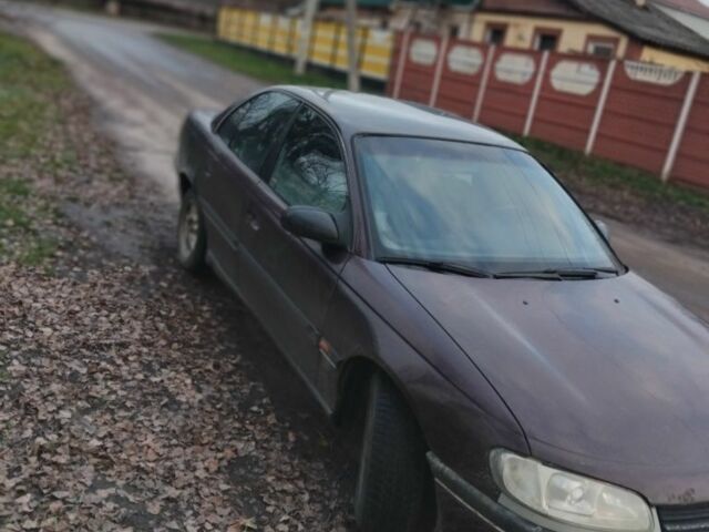Коричневий Опель Омега, об'ємом двигуна 2 л та пробігом 400 тис. км за 1184 $, фото 1 на Automoto.ua