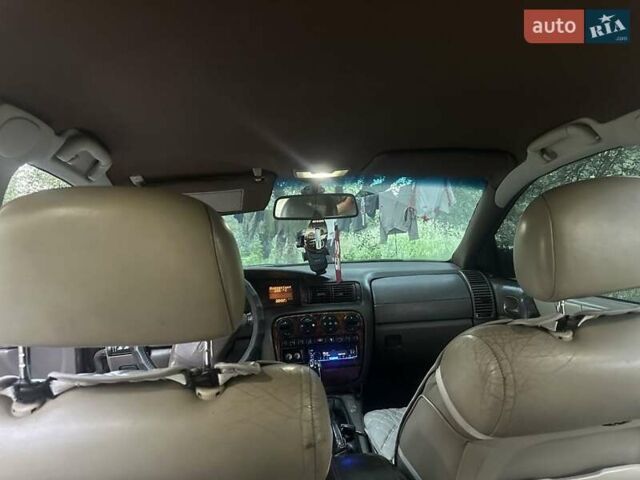 Коричневий Опель Омега, об'ємом двигуна 2 л та пробігом 465 тис. км за 2900 $, фото 12 на Automoto.ua