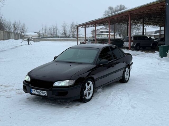 Коричневый Опель Омега, объемом двигателя 2 л и пробегом 185 тыс. км за 1650 $, фото 3 на Automoto.ua