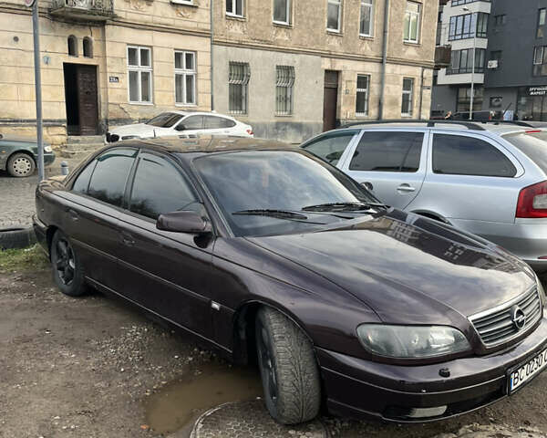 Коричневий Опель Омега, об'ємом двигуна 2.2 л та пробігом 362 тис. км за 2400 $, фото 3 на Automoto.ua