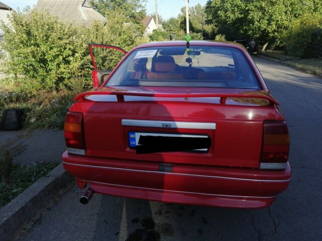 Красный Опель Омега, объемом двигателя 2 л и пробегом 200 тыс. км за 1200 $, фото 1 на Automoto.ua