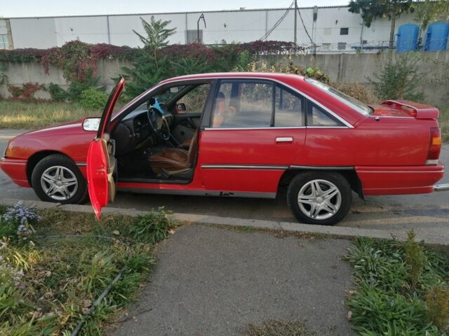 Красный Опель Омега, объемом двигателя 2 л и пробегом 200 тыс. км за 1200 $, фото 6 на Automoto.ua