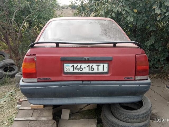 Красный Опель Омега, объемом двигателя 2 л и пробегом 300 тыс. км за 406 $, фото 1 на Automoto.ua