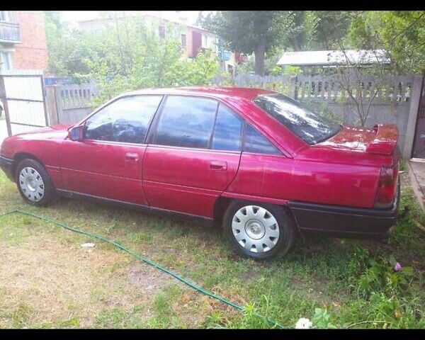 Красный Опель Омега, объемом двигателя 2.4 л и пробегом 290 тыс. км за 1300 $, фото 4 на Automoto.ua