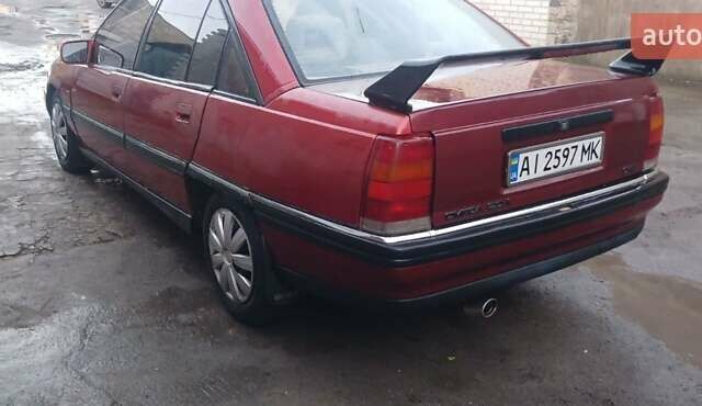Червоний Опель Омега, об'ємом двигуна 2 л та пробігом 400 тис. км за 1200 $, фото 2 на Automoto.ua