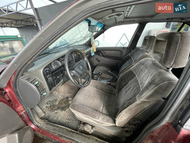 Красный Опель Омега, объемом двигателя 2 л и пробегом 332 тыс. км за 750 $, фото 7 на Automoto.ua