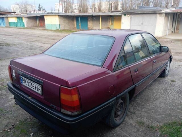 Красный Опель Омега, объемом двигателя 2 л и пробегом 333 тыс. км за 996 $, фото 4 на Automoto.ua