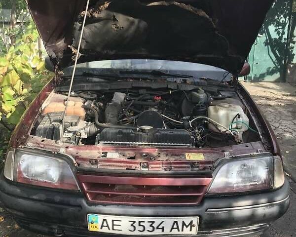 Червоний Опель Омега, об'ємом двигуна 2 л та пробігом 343 тис. км за 2000 $, фото 5 на Automoto.ua