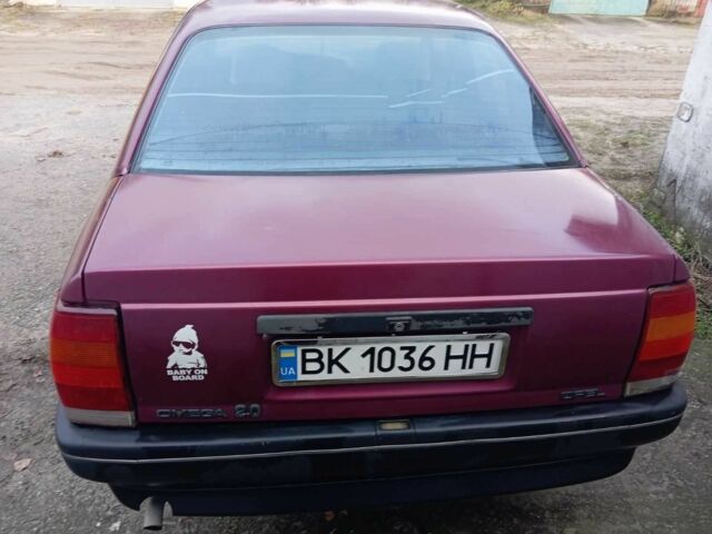 Красный Опель Омега, объемом двигателя 2 л и пробегом 333 тыс. км за 996 $, фото 3 на Automoto.ua