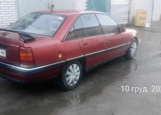 Червоний Опель Омега, об'ємом двигуна 2 л та пробігом 400 тис. км за 1200 $, фото 2 на Automoto.ua