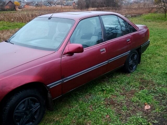 Червоний Опель Омега, об'ємом двигуна 2 л та пробігом 300 тис. км за 1300 $, фото 3 на Automoto.ua