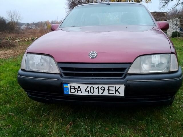 Червоний Опель Омега, об'ємом двигуна 2 л та пробігом 300 тис. км за 1300 $, фото 2 на Automoto.ua