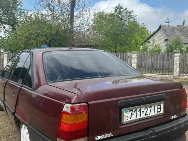 Червоний Опель Омега, об'ємом двигуна 2 л та пробігом 268 тис. км за 800 $, фото 2 на Automoto.ua