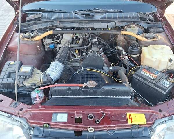 Червоний Опель Омега, об'ємом двигуна 2 л та пробігом 384 тис. км за 1250 $, фото 32 на Automoto.ua