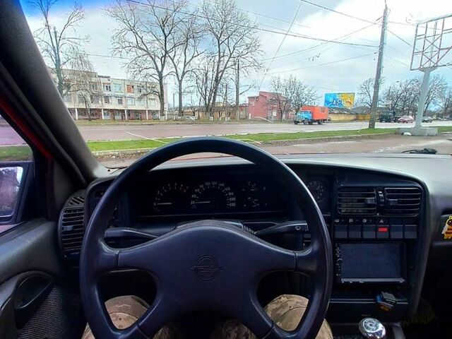 Красный Опель Омега, объемом двигателя 2 л и пробегом 309 тыс. км за 950 $, фото 9 на Automoto.ua