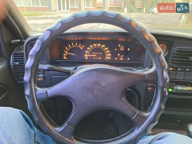 Червоний Опель Омега, об'ємом двигуна 2 л та пробігом 384 тис. км за 1250 $, фото 29 на Automoto.ua