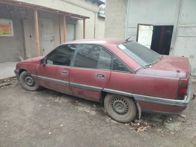 Червоний Опель Омега, об'ємом двигуна 2 л та пробігом 500 тис. км за 400 $, фото 1 на Automoto.ua
