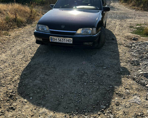 Красный Опель Омега, объемом двигателя 2.6 л и пробегом 200 тыс. км за 2300 $, фото 1 на Automoto.ua