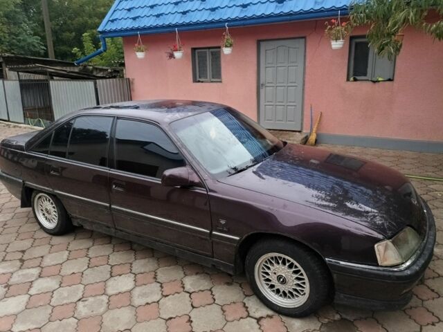 Червоний Опель Омега, об'ємом двигуна 2 л та пробігом 273 тис. км за 1500 $, фото 3 на Automoto.ua