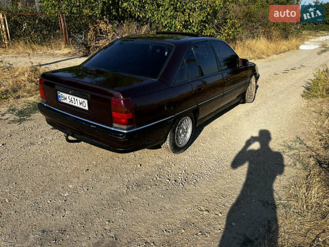 Красный Опель Омега, объемом двигателя 2.6 л и пробегом 200 тыс. км за 2300 $, фото 4 на Automoto.ua