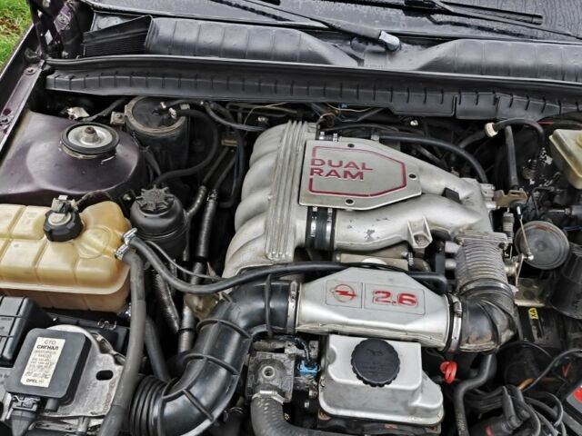 Червоний Опель Омега, об'ємом двигуна 0 л та пробігом 252 тис. км за 1200 $, фото 6 на Automoto.ua