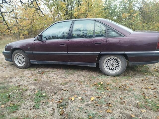 Красный Опель Омега, объемом двигателя 2 л и пробегом 224 тыс. км за 1500 $, фото 3 на Automoto.ua