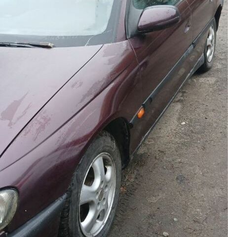 Червоний Опель Омега, об'ємом двигуна 2 л та пробігом 391 тис. км за 1832 $, фото 2 на Automoto.ua