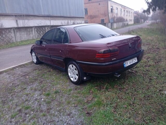 Червоний Опель Омега, об'ємом двигуна 2 л та пробігом 65 тис. км за 1550 $, фото 9 на Automoto.ua