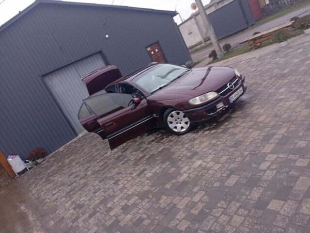 Червоний Опель Омега, об'ємом двигуна 2 л та пробігом 65 тис. км за 1550 $, фото 16 на Automoto.ua