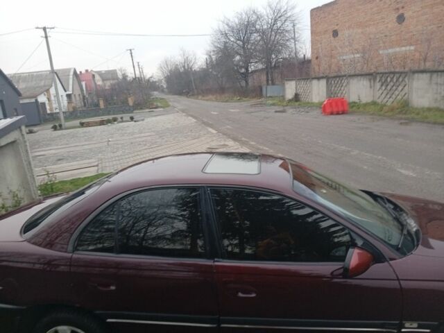 Червоний Опель Омега, об'ємом двигуна 2 л та пробігом 65 тис. км за 1550 $, фото 5 на Automoto.ua