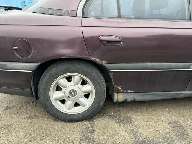 Красный Опель Омега, объемом двигателя 2.5 л и пробегом 390 тыс. км за 1800 $, фото 4 на Automoto.ua