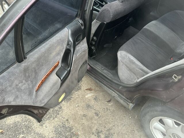 Красный Опель Омега, объемом двигателя 2.5 л и пробегом 390 тыс. км за 1800 $, фото 12 на Automoto.ua