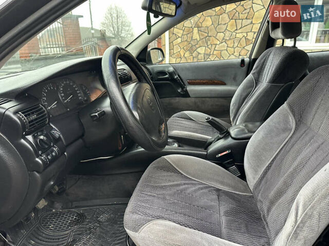 Красный Опель Омега, объемом двигателя 2 л и пробегом 301 тыс. км за 2200 $, фото 11 на Automoto.ua