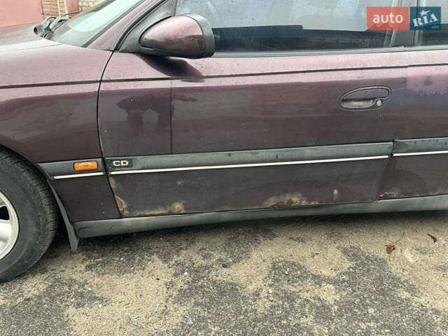 Красный Опель Омега, объемом двигателя 2.5 л и пробегом 390 тыс. км за 1800 $, фото 8 на Automoto.ua