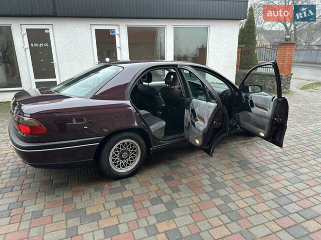 Красный Опель Омега, объемом двигателя 2 л и пробегом 301 тыс. км за 2200 $, фото 3 на Automoto.ua