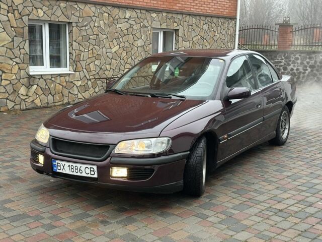 Червоний Опель Омега, об'ємом двигуна 2 л та пробігом 301 тис. км за 2200 $, фото 5 на Automoto.ua