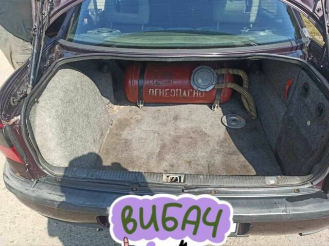 Червоний Опель Омега, об'ємом двигуна 2 л та пробігом 534 тис. км за 1200 $, фото 1 на Automoto.ua