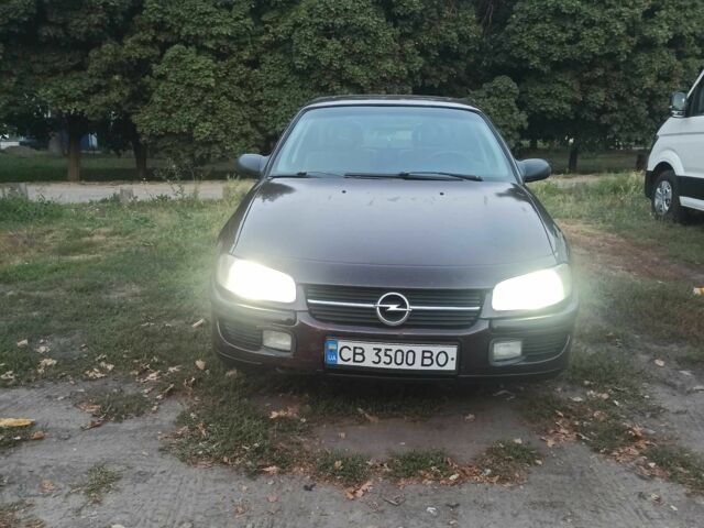 Червоний Опель Омега, об'ємом двигуна 2 л та пробігом 1 тис. км за 1350 $, фото 4 на Automoto.ua