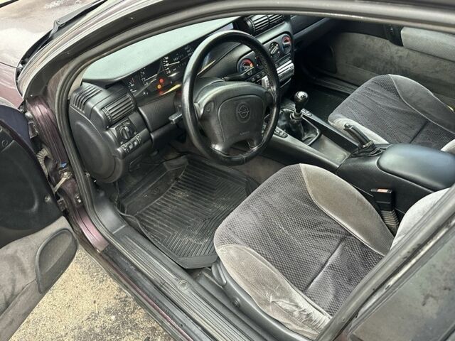 Красный Опель Омега, объемом двигателя 2.5 л и пробегом 390 тыс. км за 1800 $, фото 11 на Automoto.ua