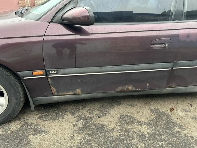 Красный Опель Омега, объемом двигателя 2.5 л и пробегом 390 тыс. км за 1800 $, фото 8 на Automoto.ua