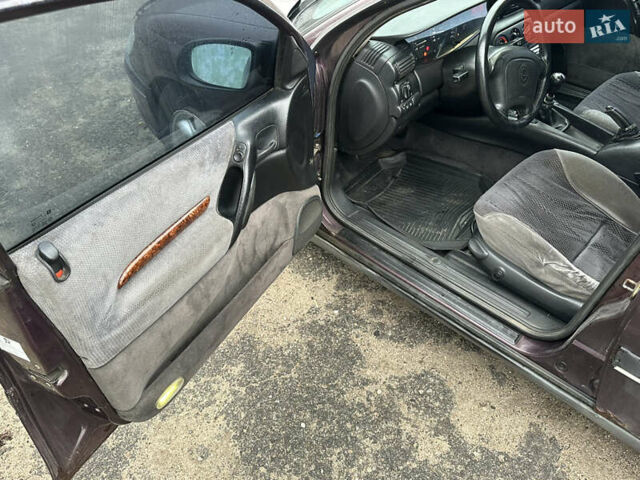 Красный Опель Омега, объемом двигателя 2.5 л и пробегом 390 тыс. км за 1800 $, фото 10 на Automoto.ua