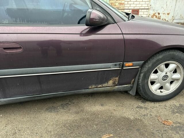 Красный Опель Омега, объемом двигателя 2.5 л и пробегом 390 тыс. км за 1800 $, фото 5 на Automoto.ua