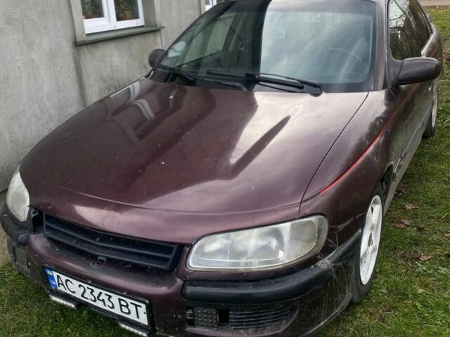 Красный Опель Омега, объемом двигателя 2.5 л и пробегом 336 тыс. км за 1100 $, фото 1 на Automoto.ua