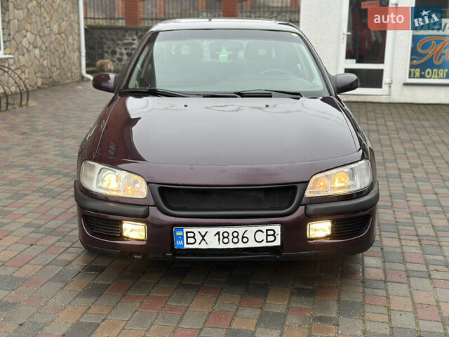 Красный Опель Омега, объемом двигателя 2 л и пробегом 301 тыс. км за 2250 $, фото 7 на Automoto.ua