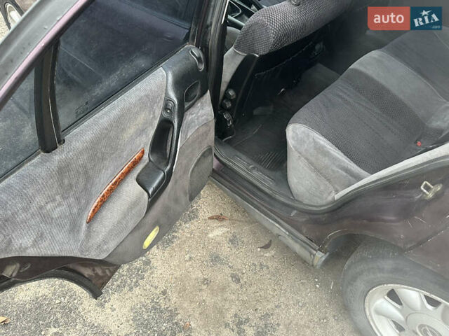 Красный Опель Омега, объемом двигателя 2.5 л и пробегом 390 тыс. км за 1800 $, фото 12 на Automoto.ua