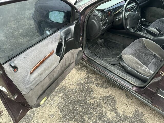 Красный Опель Омега, объемом двигателя 2.5 л и пробегом 390 тыс. км за 1800 $, фото 10 на Automoto.ua