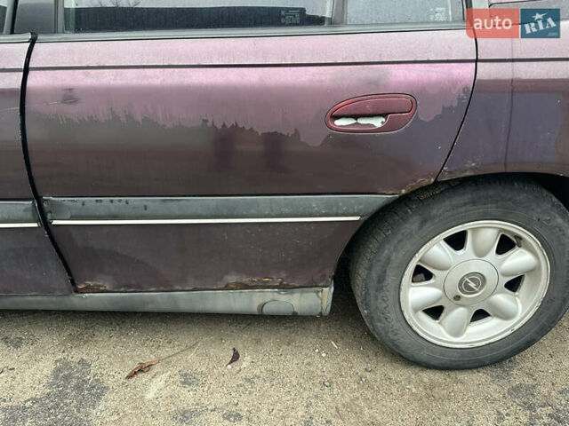 Красный Опель Омега, объемом двигателя 2.5 л и пробегом 390 тыс. км за 1800 $, фото 9 на Automoto.ua